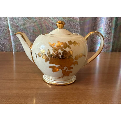 Vintage single serve Sadler teapot with gold flowers and trim
