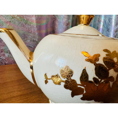 Vintage single serve Sadler teapot with gold flowers and trim