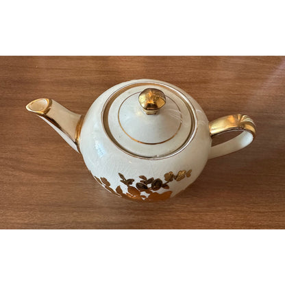 Vintage single serve Sadler teapot with gold flowers and trim